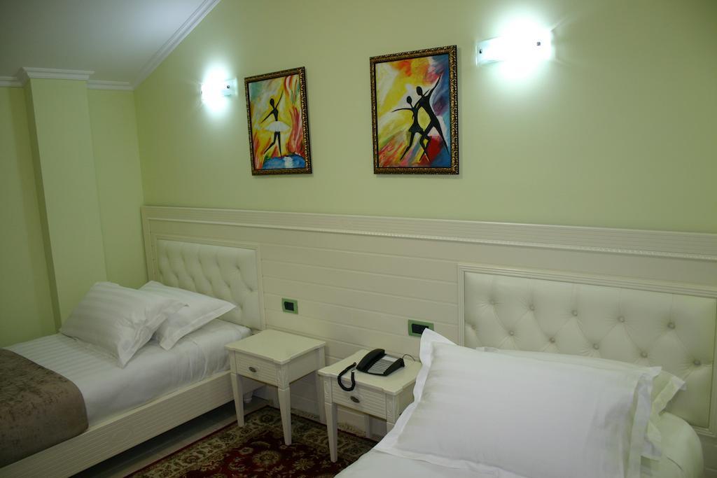 Hotel Boutique Las Тирана Стая снимка